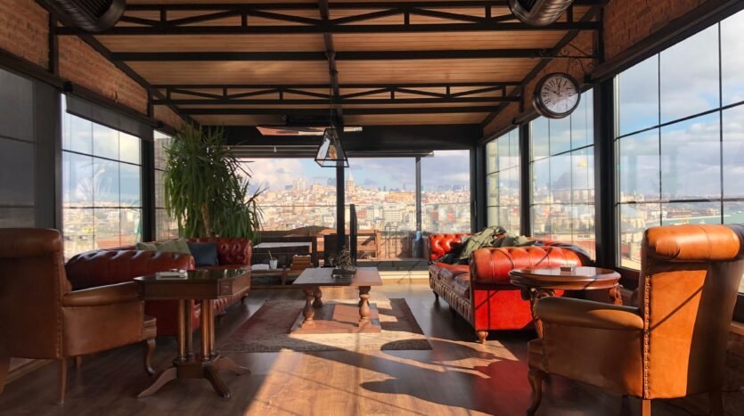 sofas and table with city view
